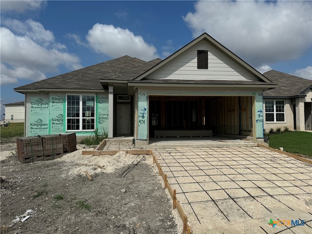 view of front of property with a garage