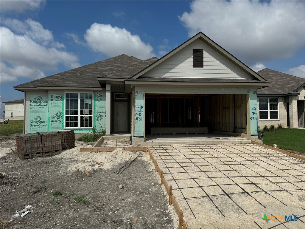 view of front of home with a garage