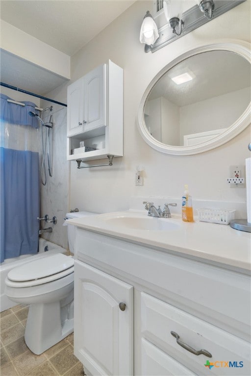 full bathroom with toilet, vanity, and shower / bathtub combination with curtain