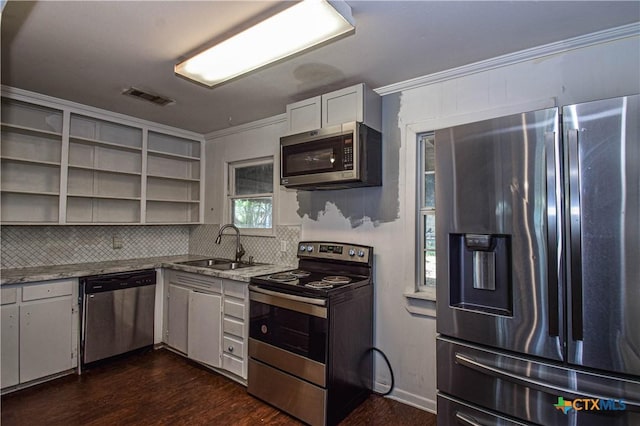 202 Margaret Lee St, Copperas Cove, TX 76522 - kitchen with stainless steel appliances, open shelves, decorative backsplash, dark wood finished floors, and ornamental molding