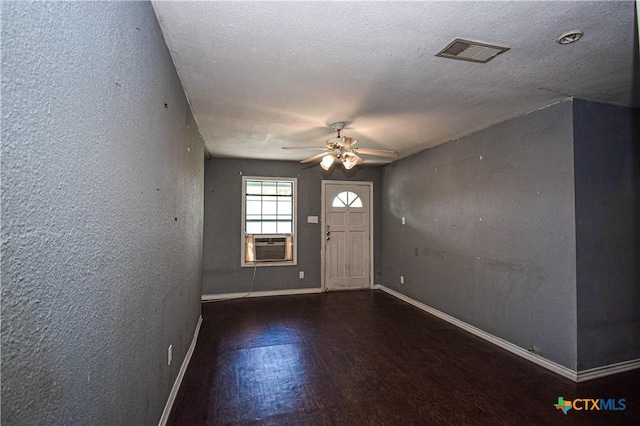 202 Margaret Lee St, Copperas Cove, TX 76522 - foyer entrance with wood finished floors, ceiling fan, a textured wall, and cooling unit