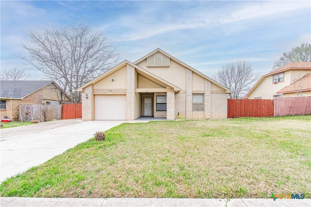 view of front facade with concrete driveway, fence, brick siding, and a garage