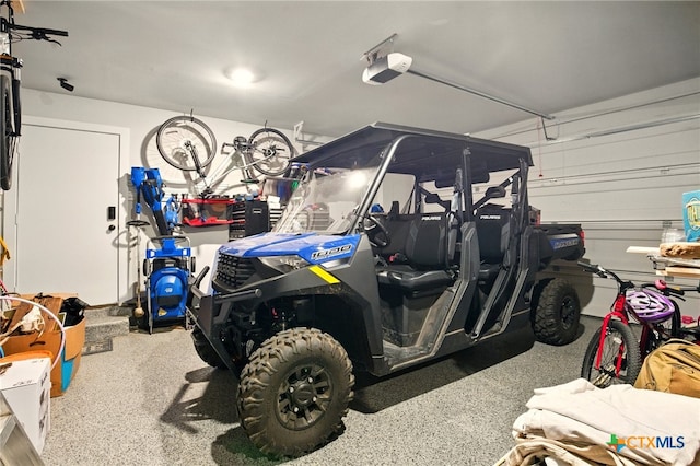 1911 Peres St, New Braunfels, TX 78132 - garage featuring a garage door opener