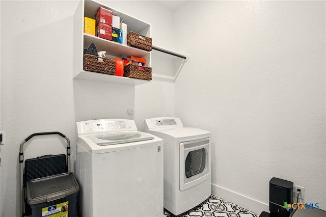 1911 Peres St, New Braunfels, TX 78132 - laundry room featuring washing machine and dryer and baseboards