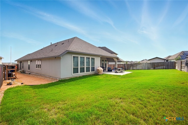1911 Peres St, New Braunfels, TX 78132 - rear view of property with a patio area, roof with shingles, and stucco siding