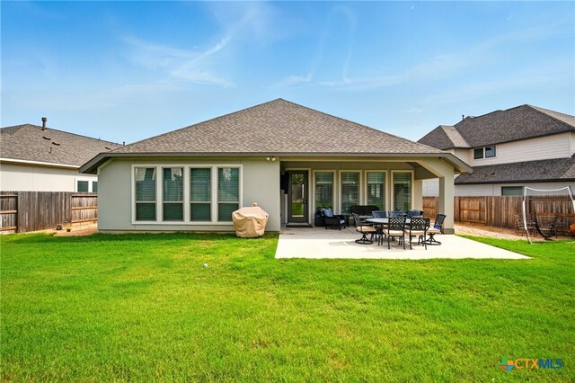 1911 Peres St, New Braunfels, TX 78132 - rear view of house with stucco siding, a patio area, and roof with shingles