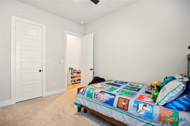 1911 Peres St, New Braunfels, TX 78132 - carpeted bedroom featuring baseboards and ceiling fan