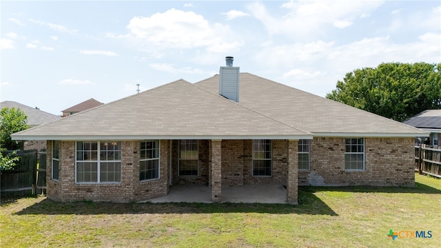 3102 Wisteria Ln, Killeen, TX 76549 - back of house with a patio, a chimney, and brick siding