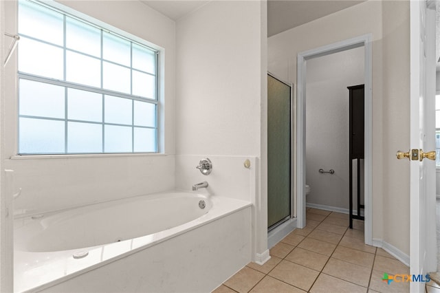 3102 Wisteria Ln, Killeen, TX 76549 - bathroom featuring a garden tub, tile patterned flooring, and a stall shower