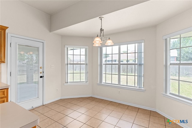 3102 Wisteria Ln, Killeen, TX 76549 - unfurnished dining area with a chandelier and light tile patterned floors