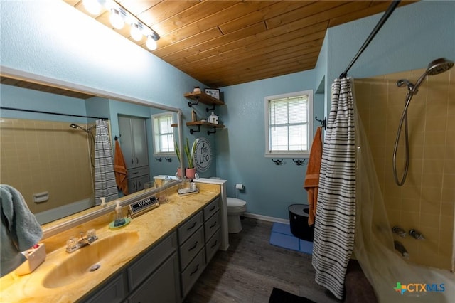 108 Elaine St, Victoria, TX 77904 - full bathroom featuring wood finished floors, vanity, wood ceiling, shower / tub combo, and toilet
