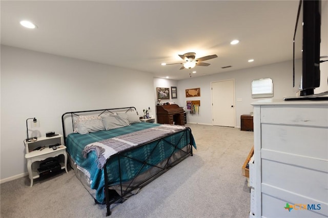 108 Elaine St, Victoria, TX 77904 - bedroom with light carpet, a ceiling fan, visible vents, and recessed lighting