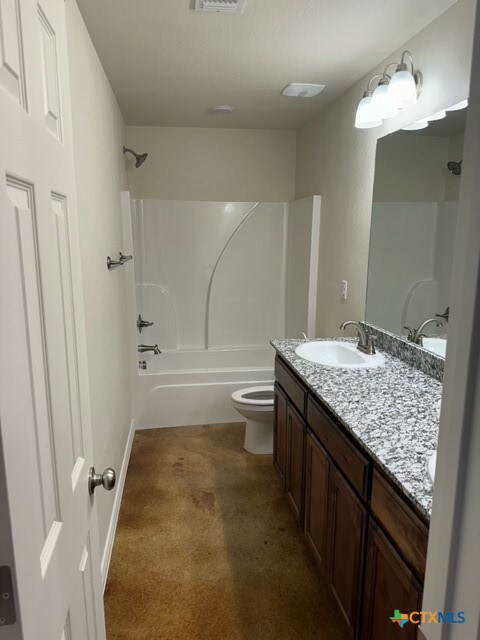 full bathroom with vanity, toilet, and shower / bathing tub combination