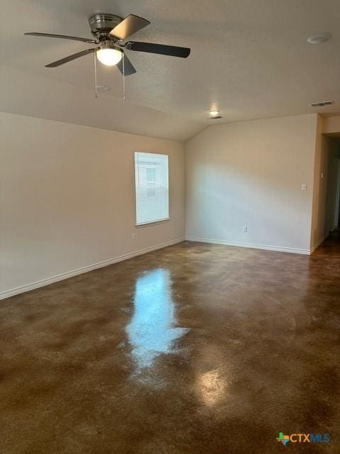 206 E Washington Ave, Copperas Cove, TX 76522 - spare room featuring concrete flooring, lofted ceiling, ceiling fan, and baseboards