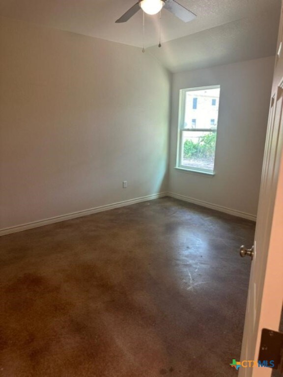 spare room featuring ceiling fan