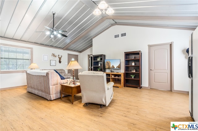 living room with light wood-type flooring, vaulted ceiling, and ceiling fan