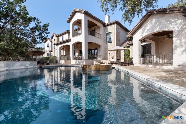 view of patio / terrace featuring french doors, an outdoor living space, and area for grilling