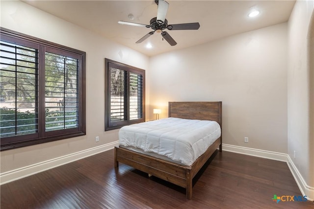 bedroom featuring a ceiling fan, recessed lighting, baseboards, and wood finished floors