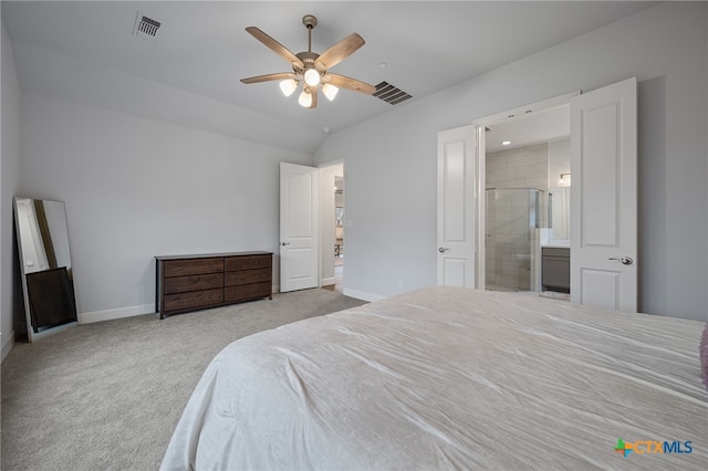 bedroom featuring carpet floors, baseboards, visible vents, and vaulted ceiling