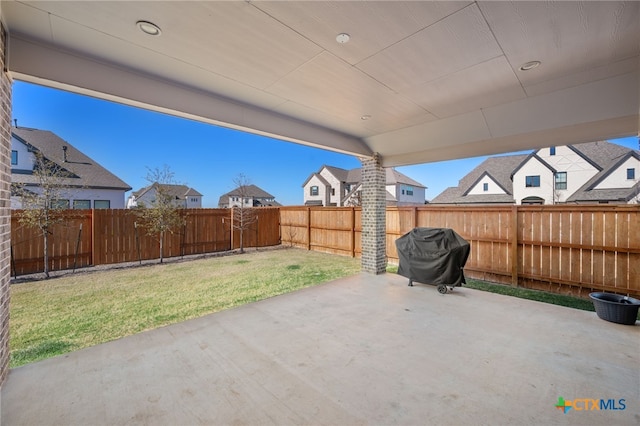 view of patio featuring a fenced backyard and area for grilling