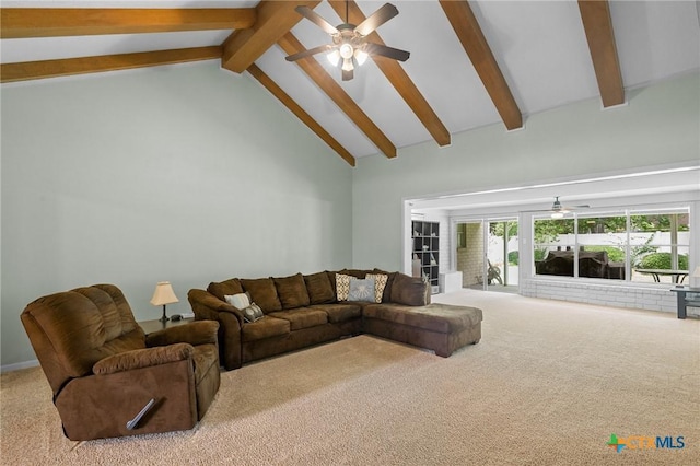 114 Berkshire Ln, Victoria, TX 77904 - living area featuring a ceiling fan, carpet floors, high vaulted ceiling, and beam ceiling