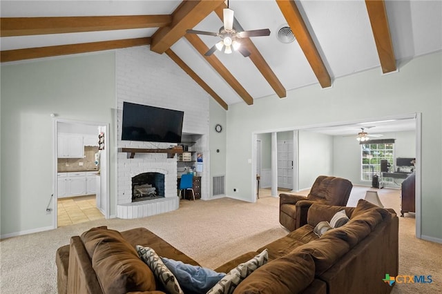 114 Berkshire Ln, Victoria, TX 77904 - living room with a ceiling fan, light carpet, a brick fireplace, beam ceiling, and high vaulted ceiling