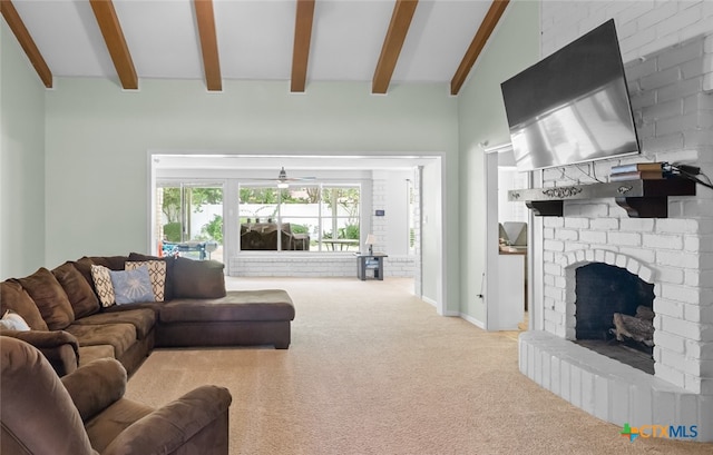 114 Berkshire Ln, Victoria, TX 77904 - carpeted living room with a fireplace and a ceiling fan