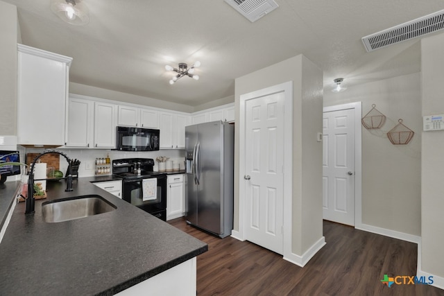 kitchen featuring dark hardwood / wood-style floors, sink, white cabinets, decorative backsplash, and black appliances