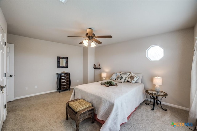 bedroom featuring light carpet and ceiling fan