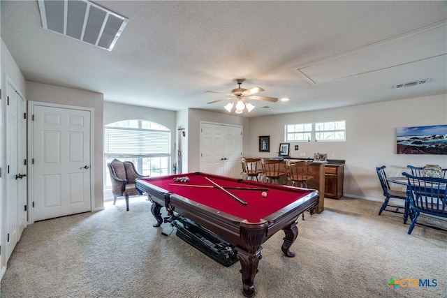 playroom featuring carpet, a healthy amount of sunlight, pool table, and bar area