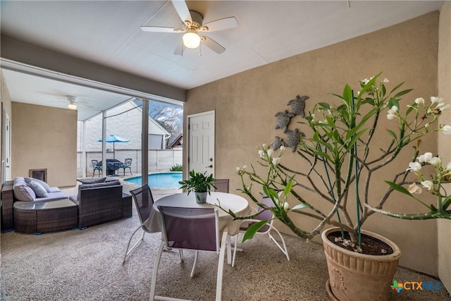 interior space featuring ceiling fan