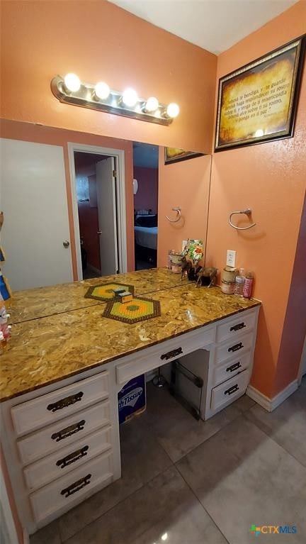 bathroom featuring vanity and tile patterned floors