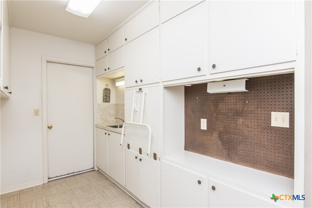 kitchen with white cabinetry