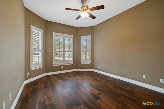815 Lost Maples Trl, Georgetown, TX 78633 - unfurnished room featuring dark wood finished floors, ceiling fan, and baseboards