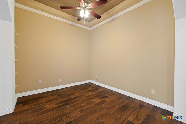 815 Lost Maples Trl, Georgetown, TX 78633 - spare room with dark wood-type flooring, a raised ceiling, a ceiling fan, baseboards, and crown molding