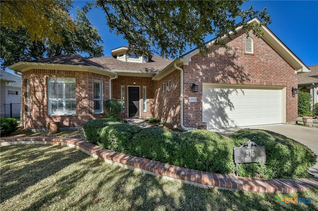 815 Lost Maples Trl, Georgetown, TX 78633 - view of front of property with a garage, concrete driveway, and brick siding