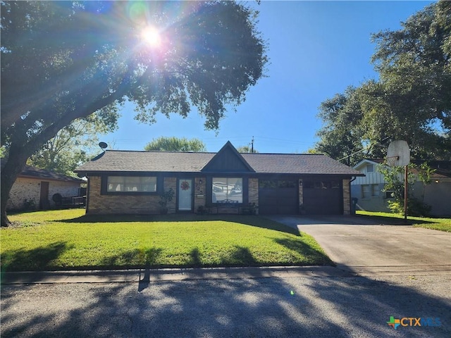 ranch-style house with a front lawn and a garage