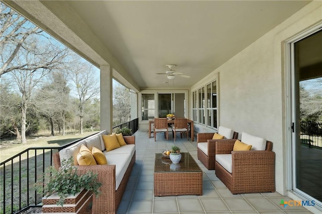 exterior space with ceiling fan