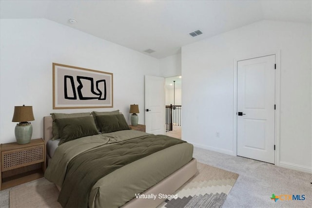 288 Smithsonian Ln, Kyle, TX 78640 - carpeted bedroom featuring lofted ceiling, visible vents, and baseboards