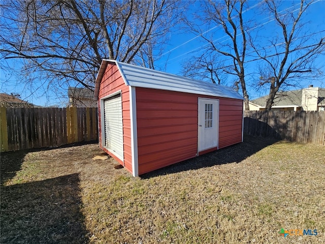 view of outdoor structure featuring a yard