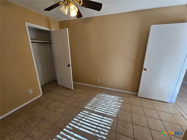 unfurnished bedroom featuring a closet, ceiling fan, and light tile patterned flooring