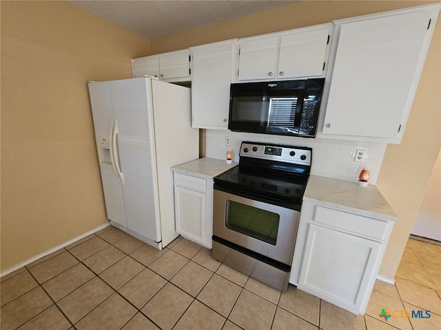 kitchen featuring white refrigerator with ice dispenser, white cabinets, backsplash, and electric stove