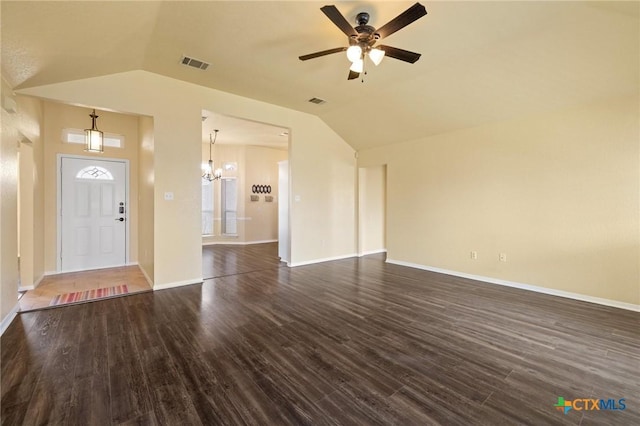 interior space with dark wood-style flooring, visible vents, and vaulted ceiling