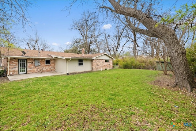 view of yard with a patio area and fence