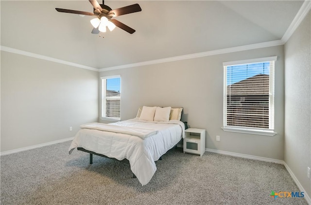 bedroom featuring multiple windows, ceiling fan, carpet floors, and ornamental molding