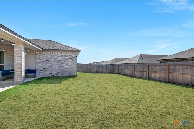 view of yard with an outdoor living space