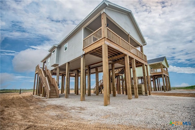 177 Powderhorn Ln, Port Lavaca, TX 77979 - back of house featuring a wooden deck and stairway