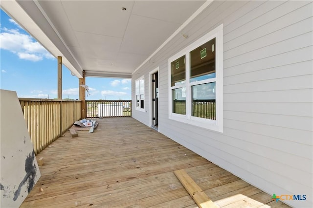 wooden terrace with covered porch