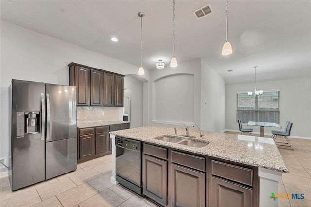 kitchen with stainless steel refrigerator with ice dispenser, sink, dark brown cabinetry, and dishwasher