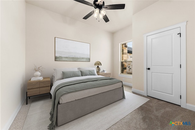 bedroom featuring ceiling fan and carpet floors